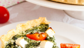 Quiche with spinach, cherry tomatoes and feta cheese -