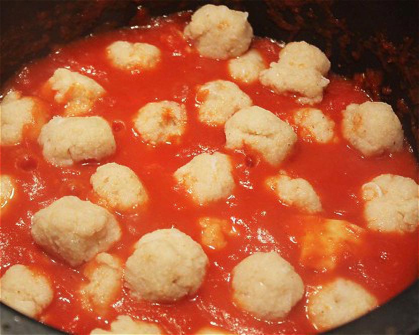 cooking fish meatballs with tomato sauce -