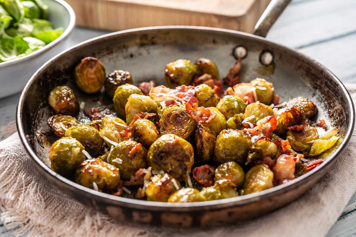 coles de bruselas con jamón