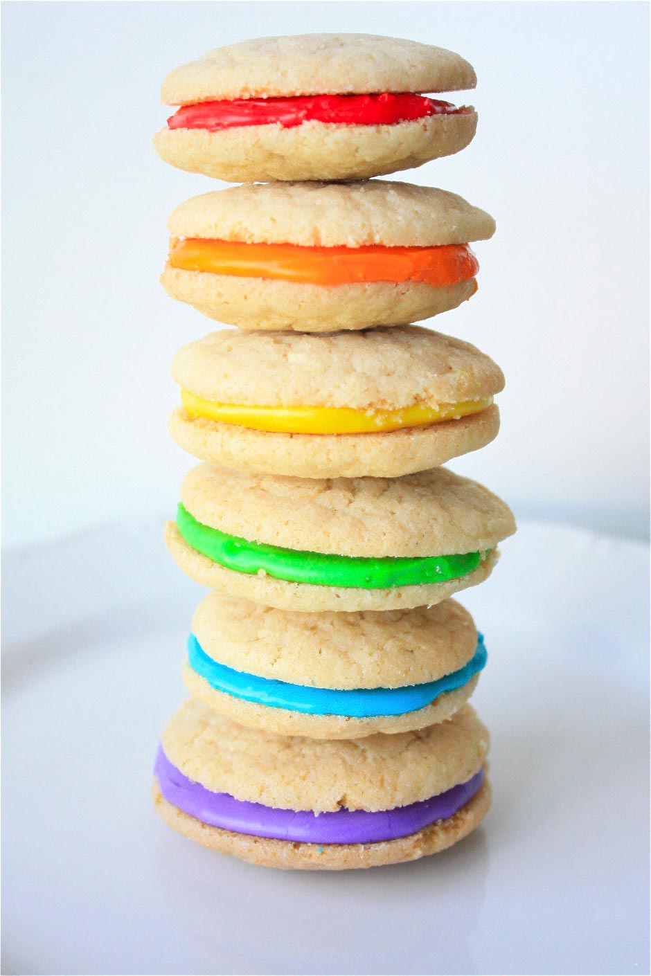 como hacer sandwich de galletas con glaseado de colores
